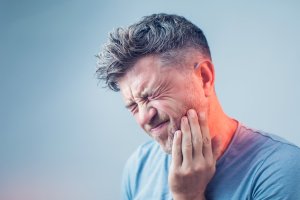Man with a toothache