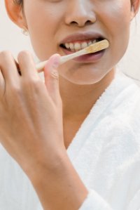 Lady Brushing her teeth