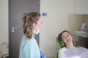 Smiling woman at dentist Idaho Falls